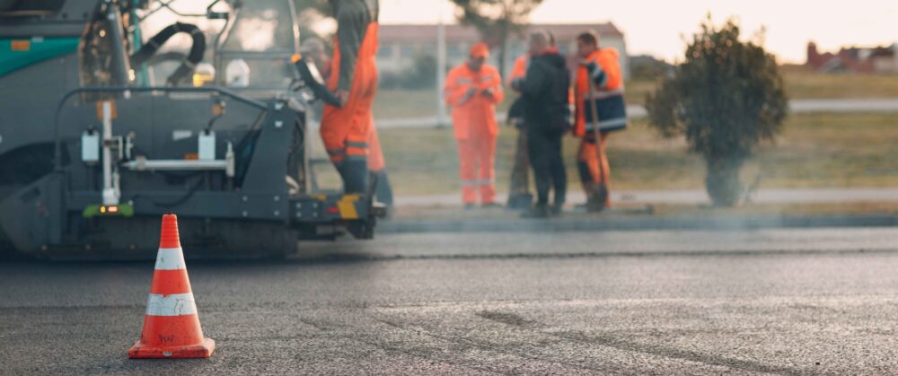 asphalt-paving-paver-machine-and-workers