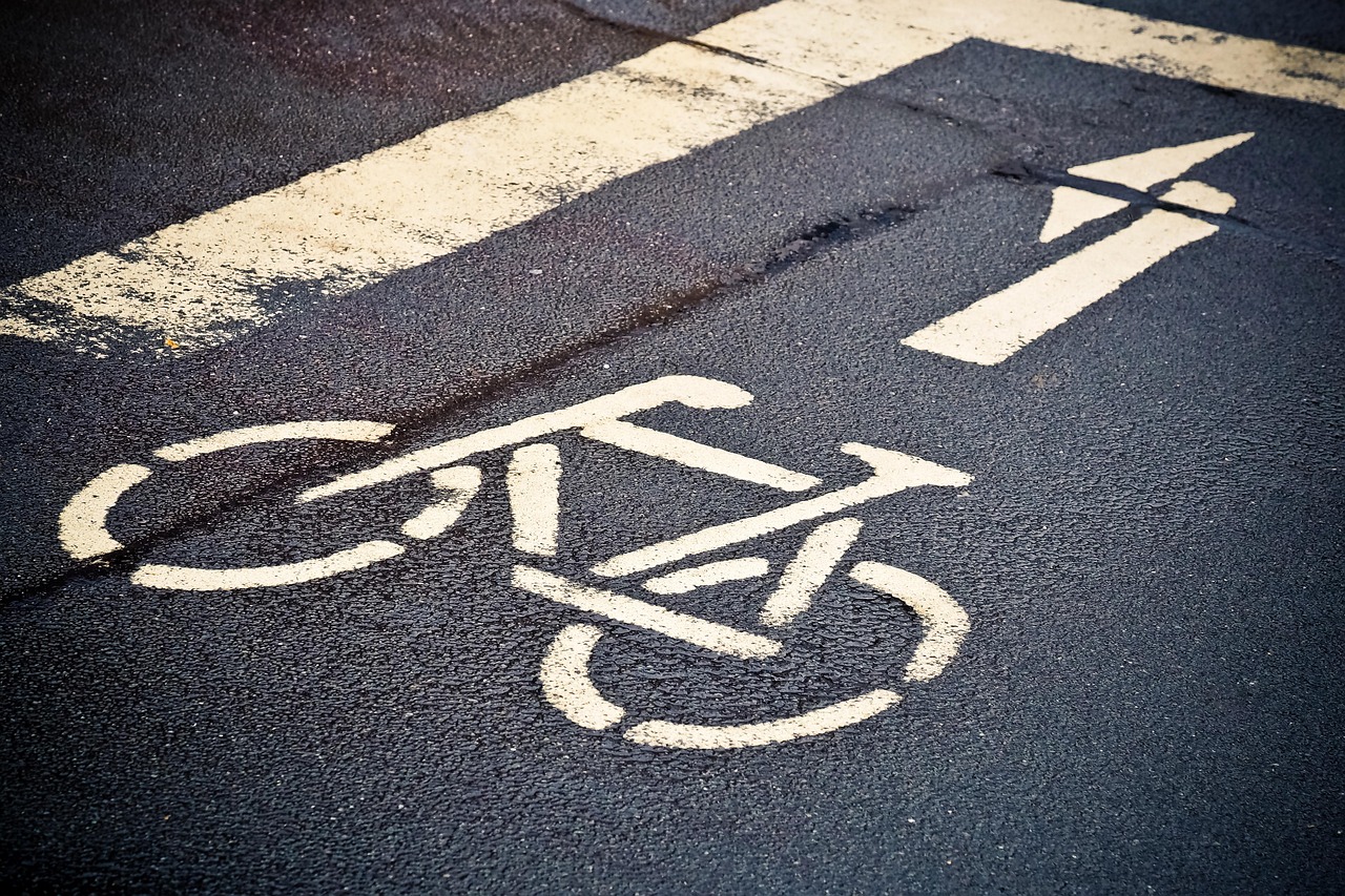 A busy intersection with clear road markings guiding traffic