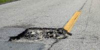 dangerous-pothole-on-american-road-surface-ruined-2024-12-06-00-48-39-utc_11zon