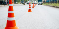 traffic-safety-cones-on-asphalt-of-road-selective-2025-03-13-19-11-00-utc