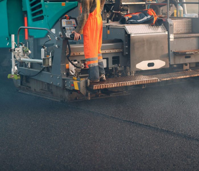 asphalt-paving-paver-machine-and-workers-new-roa-2024-12-05-00-40-19-utc