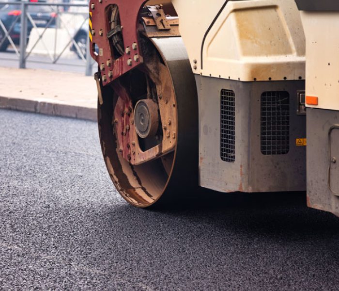 urban-asphalt-paving-transforms-city-streets-durin-2025-10-06-21-47-41-utc