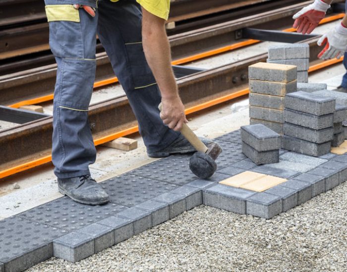 worker-hand-with-hammer-places-concrete-pavement-s-2025-10-16-21-42-28-utc